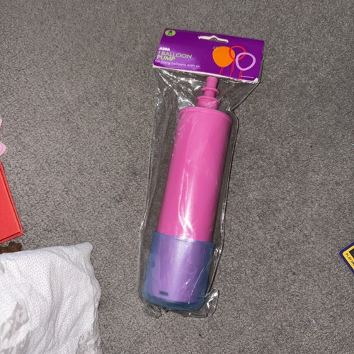 Asda balloon pump - balloon, held
